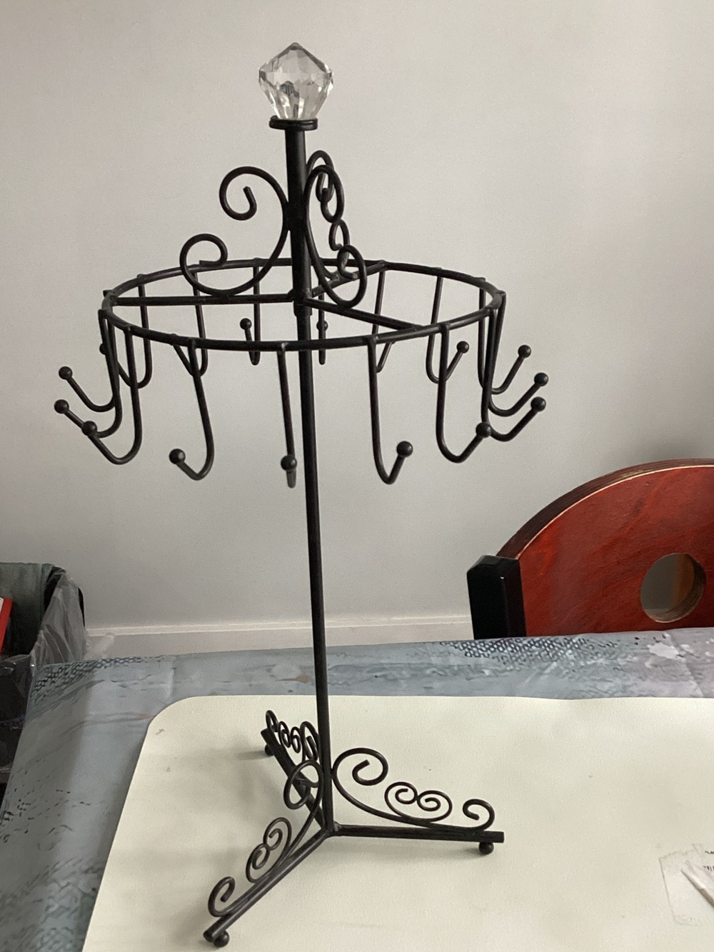 Source Unknown Black Metal Rotating Jewelry Tree with Crystal Top